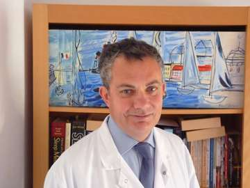 Dr. Damien Leger